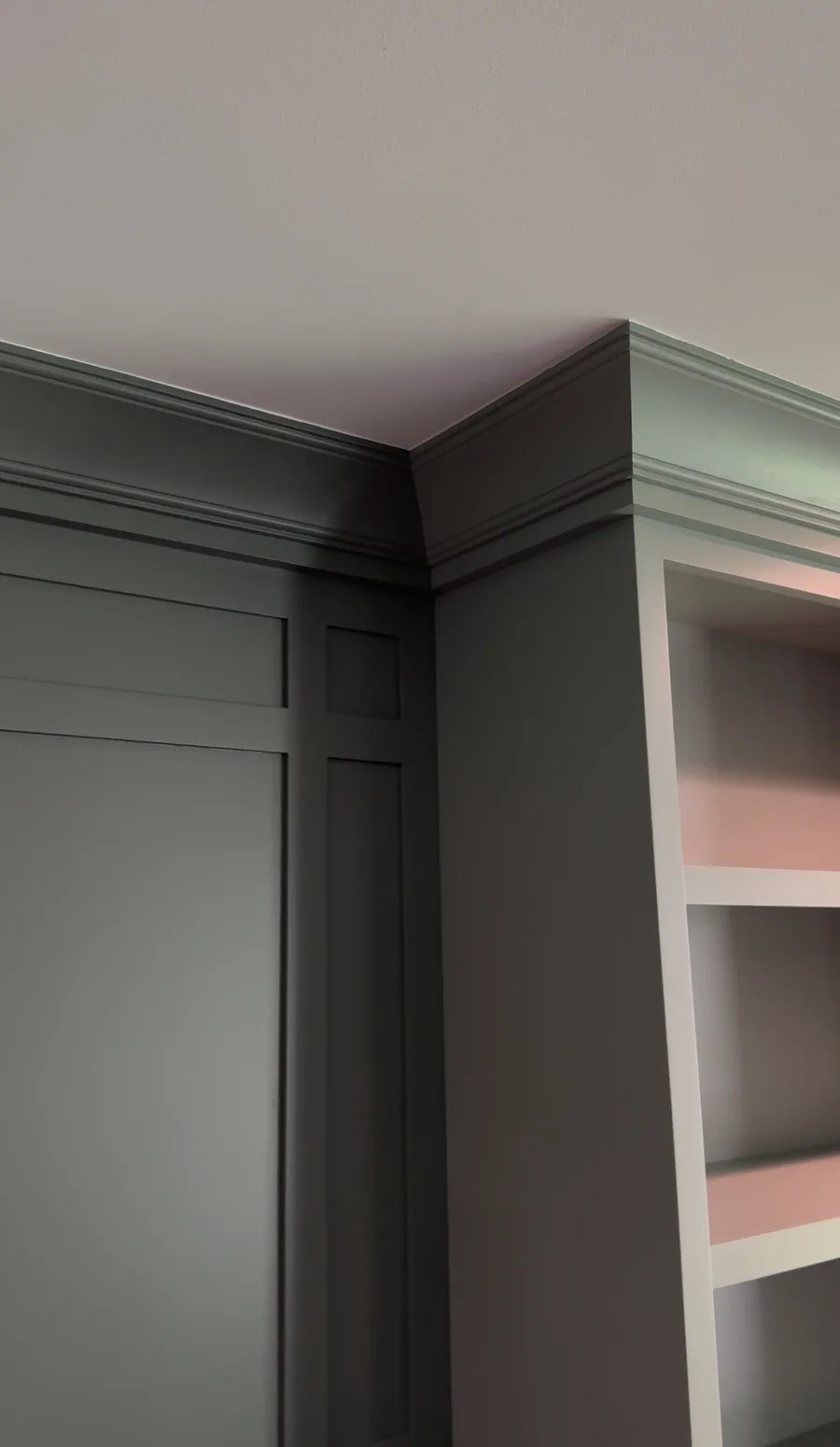 Crown moulding corner detail at cabinet-to-panel junction, Newtown Square family room